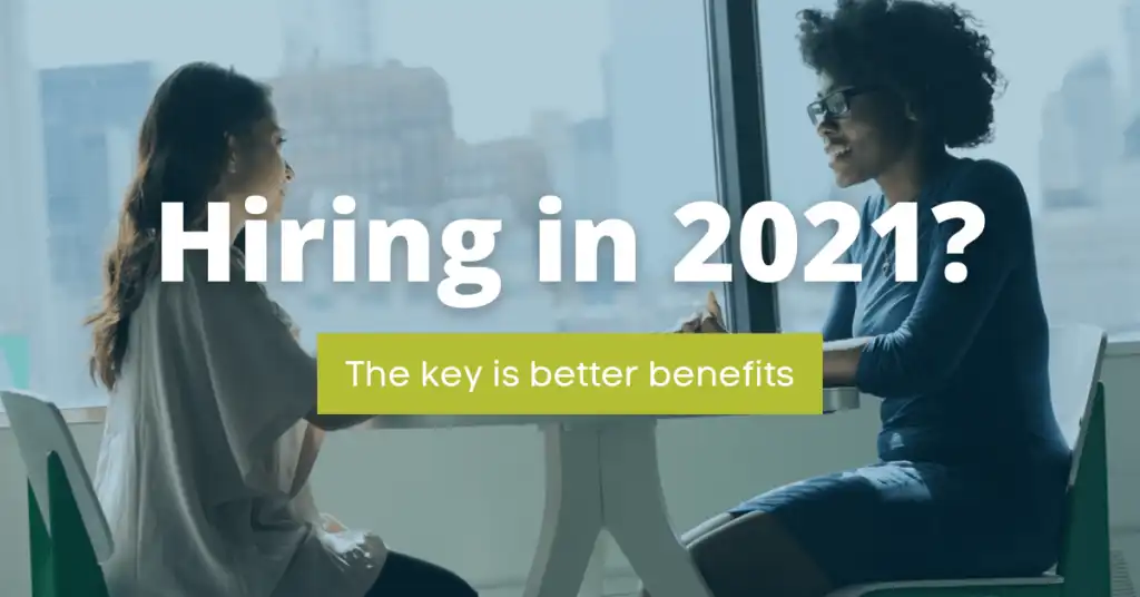 Recruiter and candidate chatting in front of window. text "Hiring in 2021? The key is better benefits"