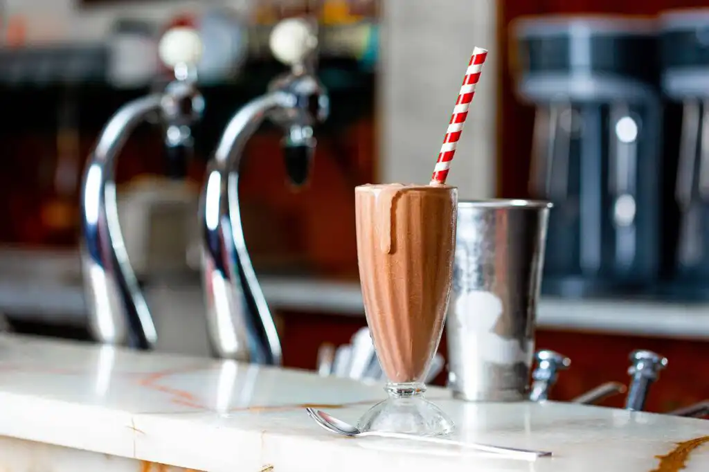 Chocolate milkshake on a diner table