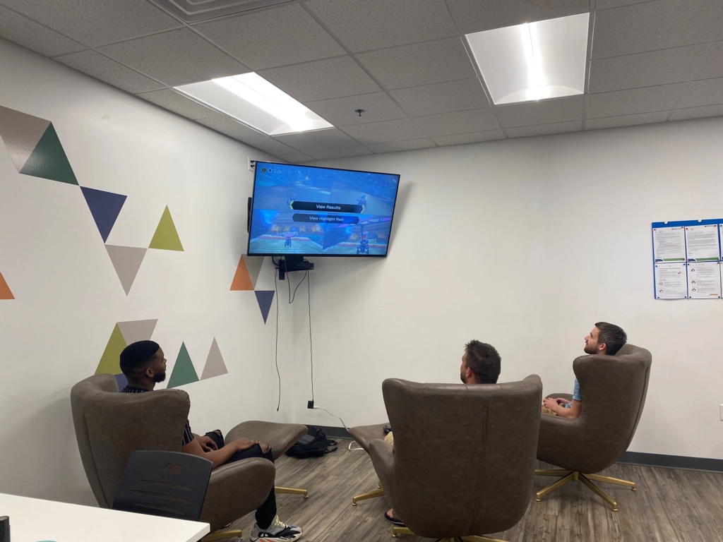 coworkers playing Mario Kart