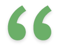 A green opening quotation mark