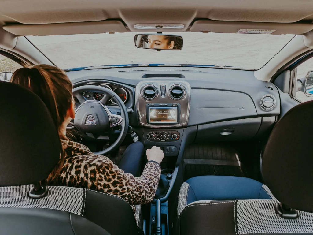 Woman driving for ride share service.