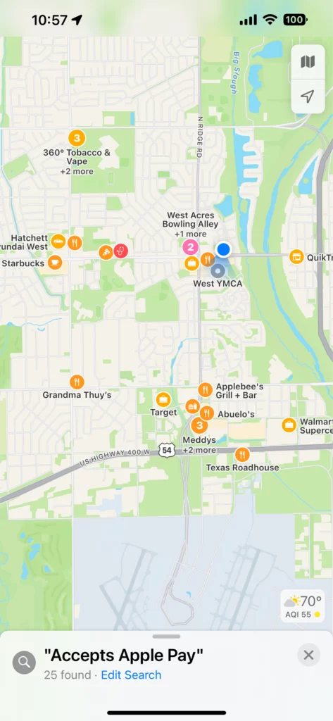 Screenshot from an iPhone following the steps above. They’ve searched “Accepts Apple  
Pay” within their Apple Maps app, and they have several businesses in the area with a pinpoint.