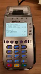 Verifone terminal on table displaying two options; Edit or Start